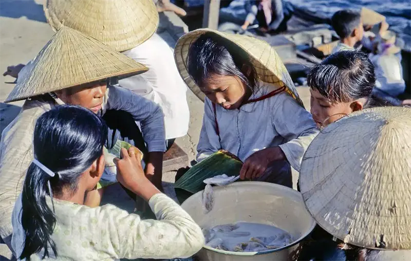 Riverfront fast food in My Tho, Mekong River, 1969.