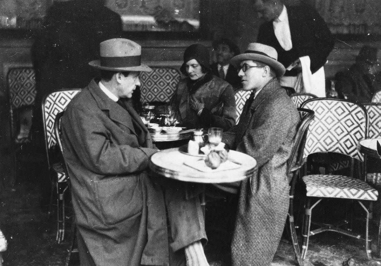 Walter Gropius with Wife and Le Corbusier at Cafe des Deux Magots, Paris