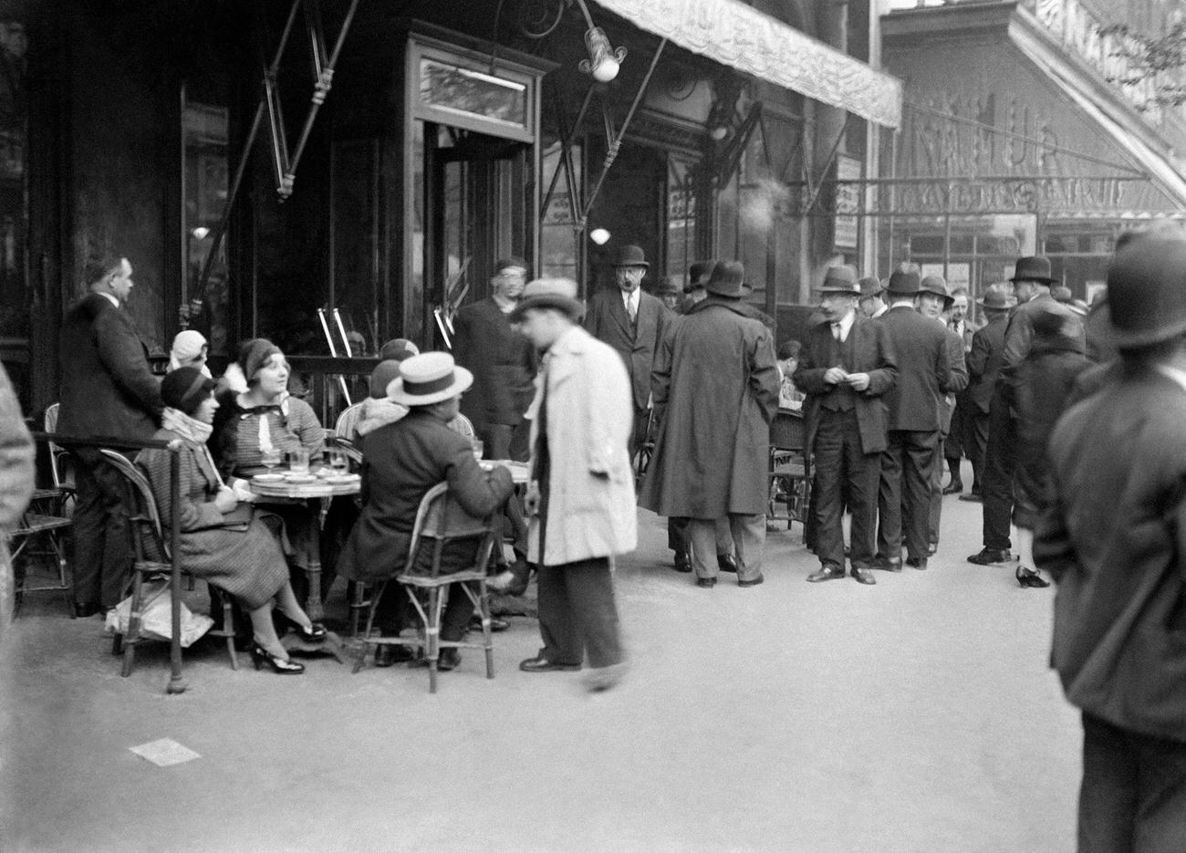 Patrons at a Parisian Cafe Terrace, 1930