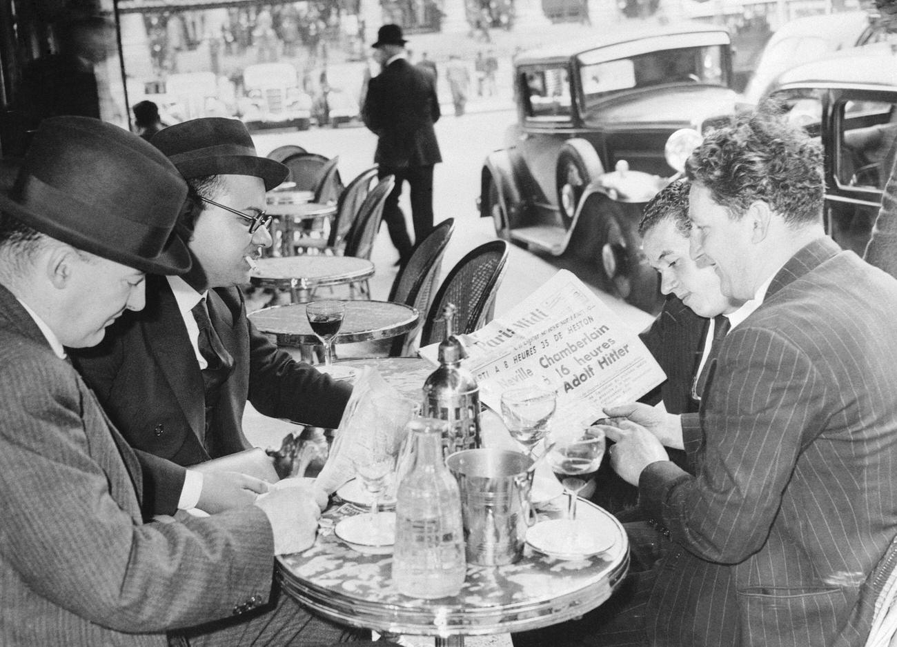 Cafe Patrons Discussing War News, Paris, Late 1930s