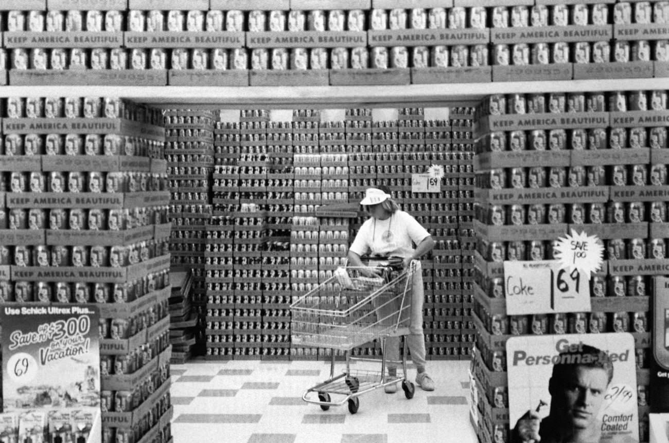 Wall of Coca-Cola cans in a supermarket in New Mexico, United States.