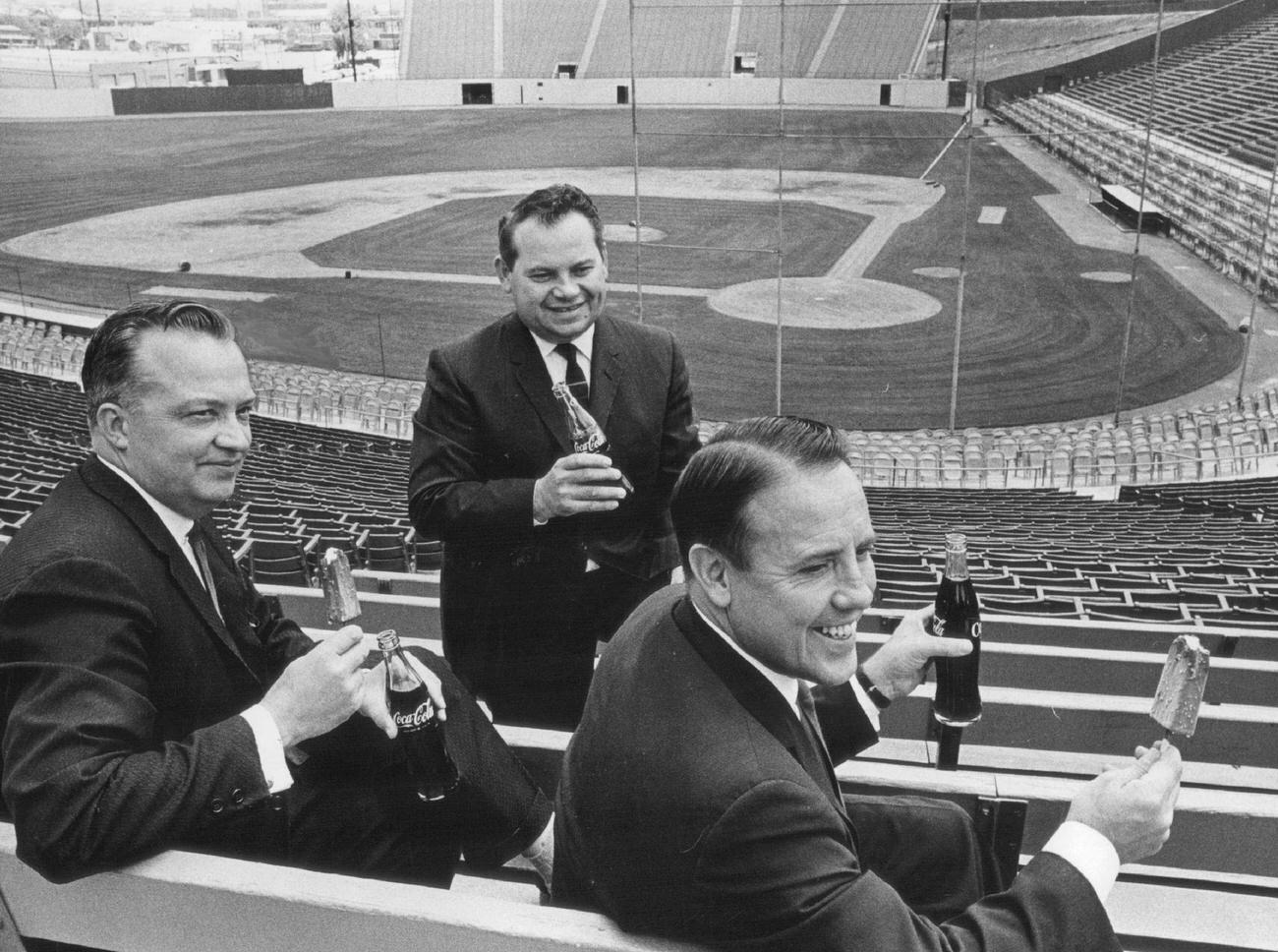 Denver Bears Clinic officials sampling refreshments, 1965.