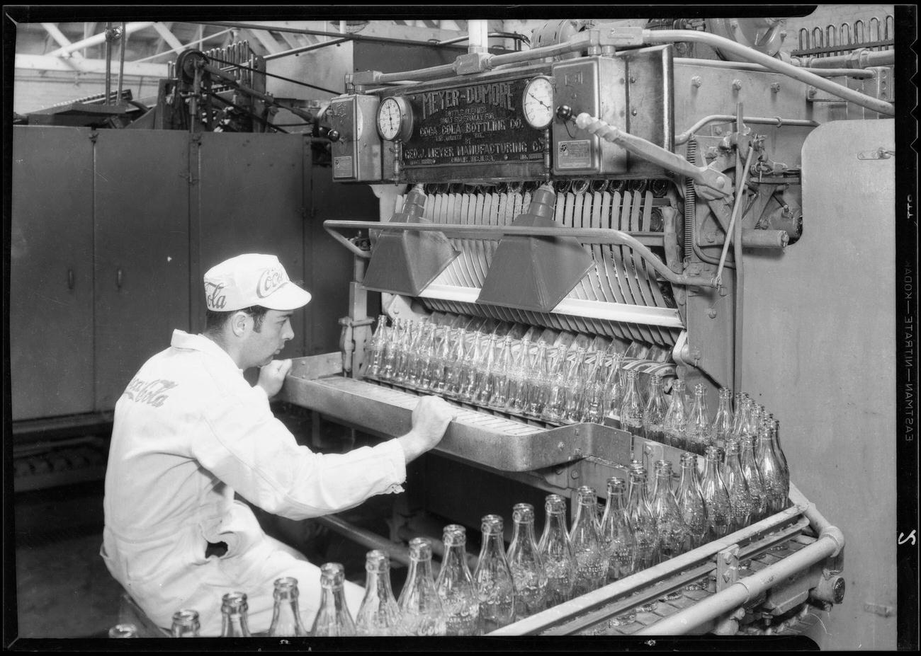 Bottle inspection operations at a Coca-Cola plant in Southern California, 1933.