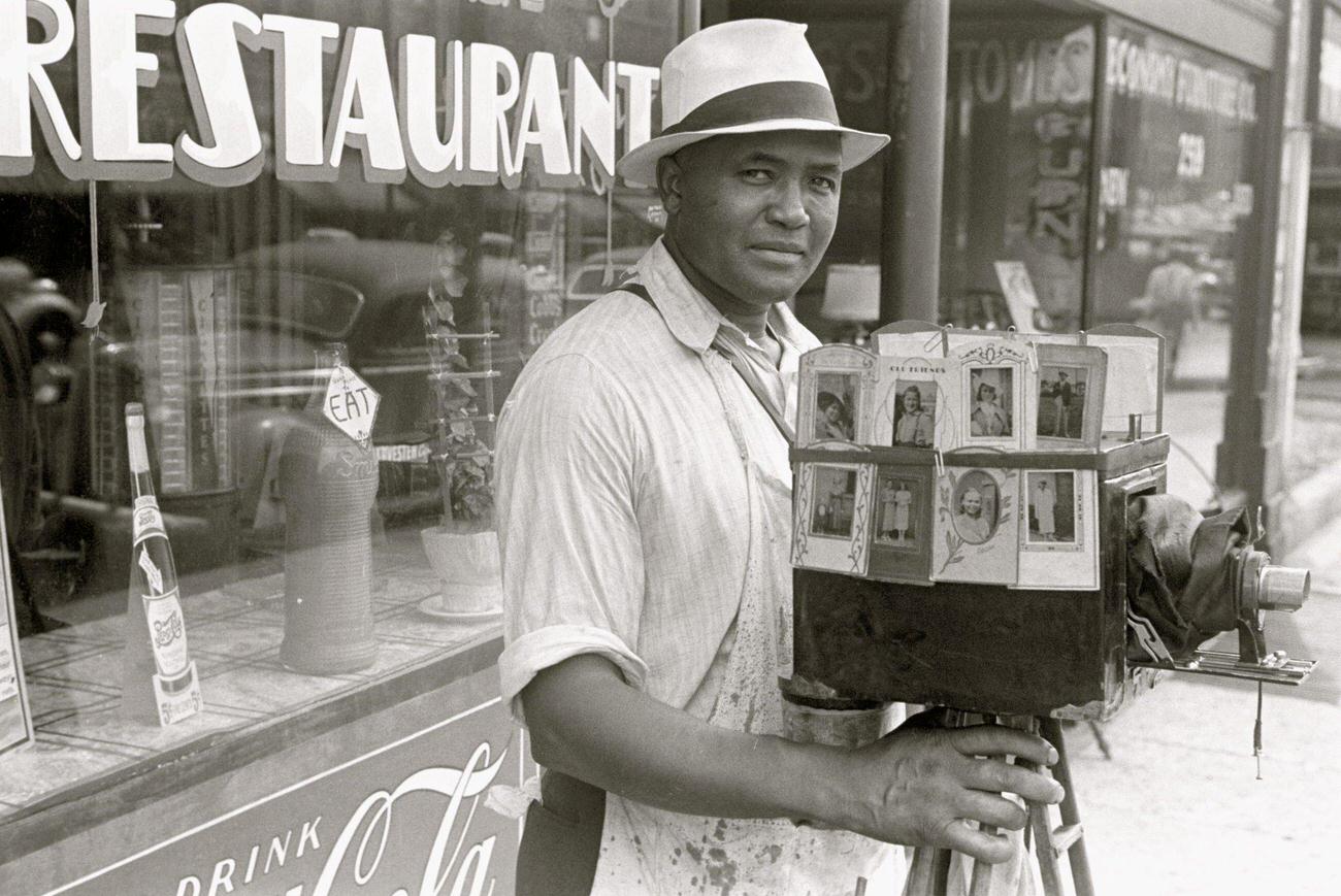 African American itinerant photographer in Columbus, Ohio, circa 1935.
