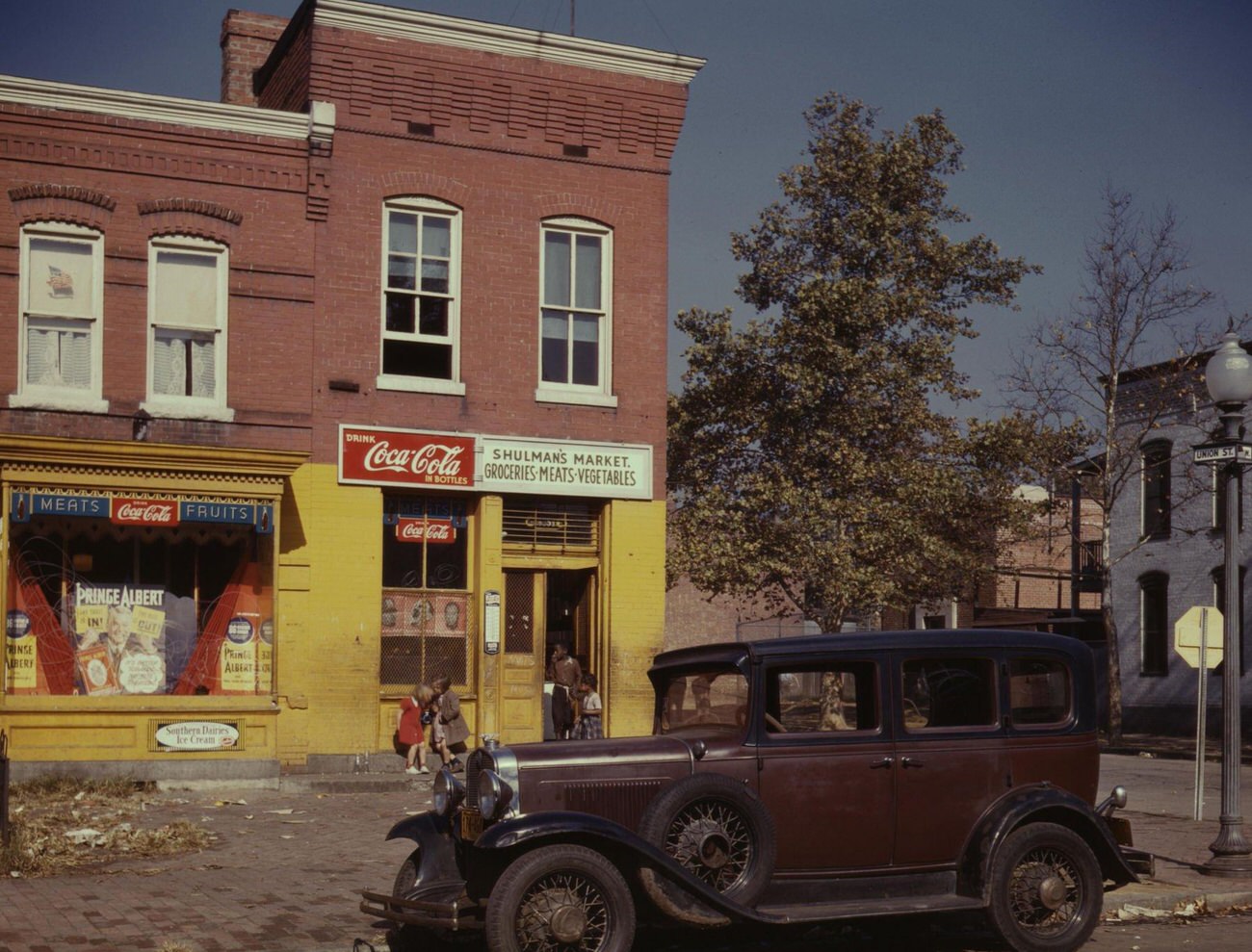 Shulman's Market at N and Union Streets SW, Washington, D.C., with a 1931 Chevrolet, 1941.