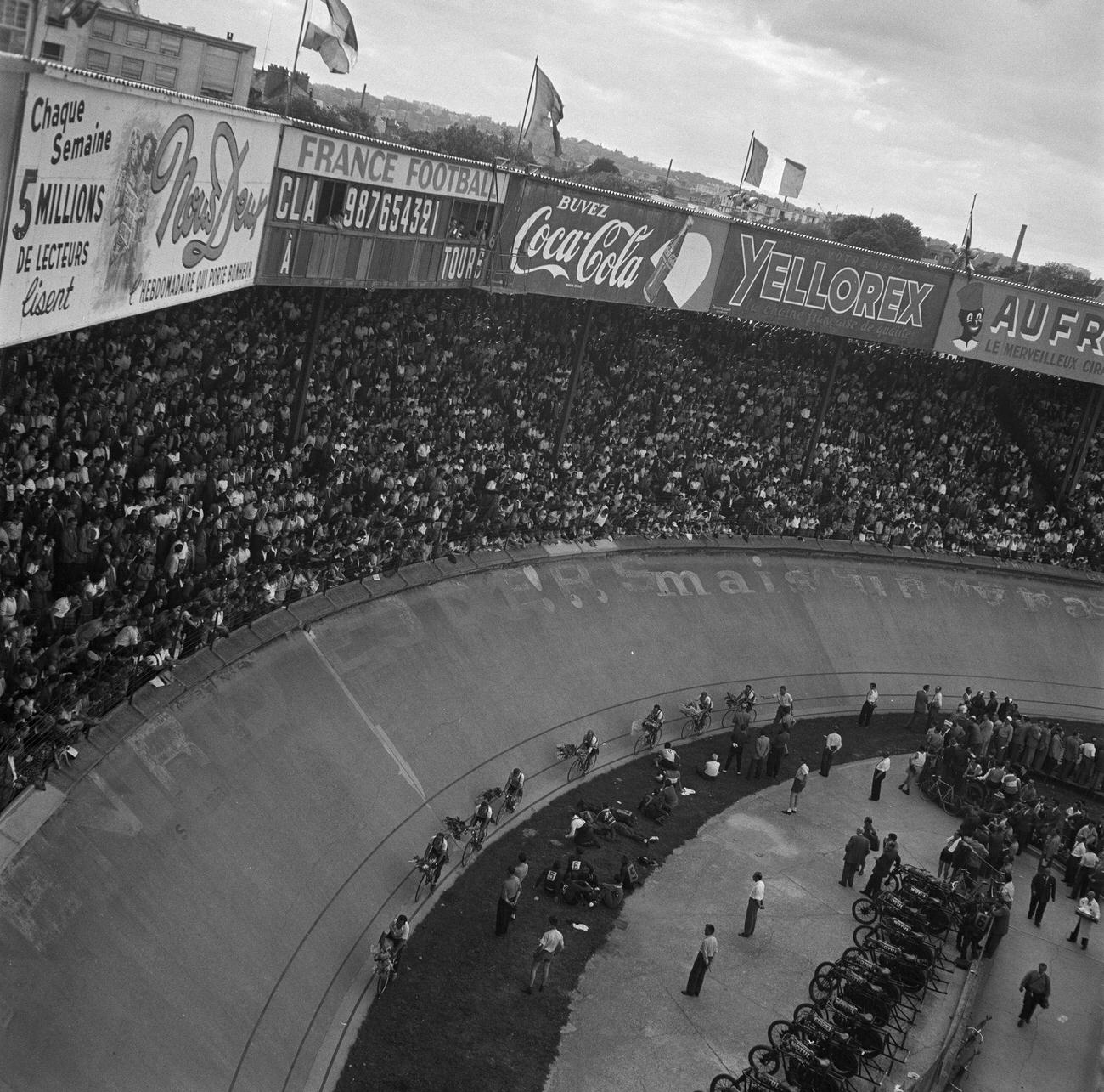 39th Tour De France arrival in Paris, 1952, with painted advertisements.