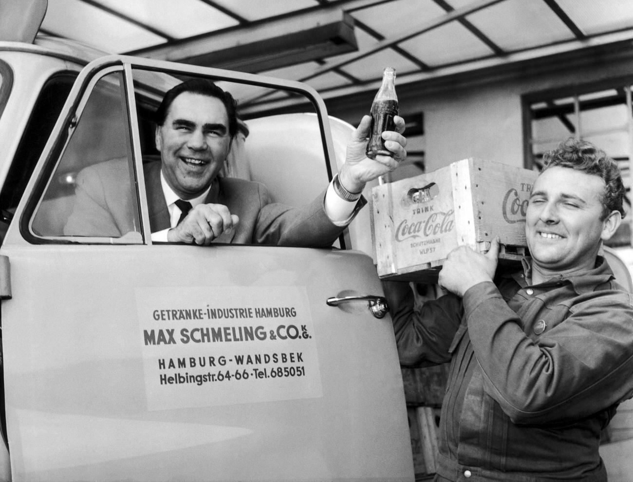 Boxer Max Schmeling promoting Coca-Cola in Germany,1957.