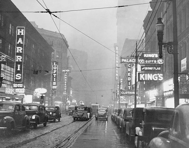 600 block of Liberty Avenue with light smoke, busy street scene with various stores.