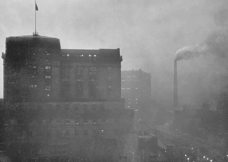 Factory chimney emitting smoke in Pittsburgh, contributing to severe air pollution.