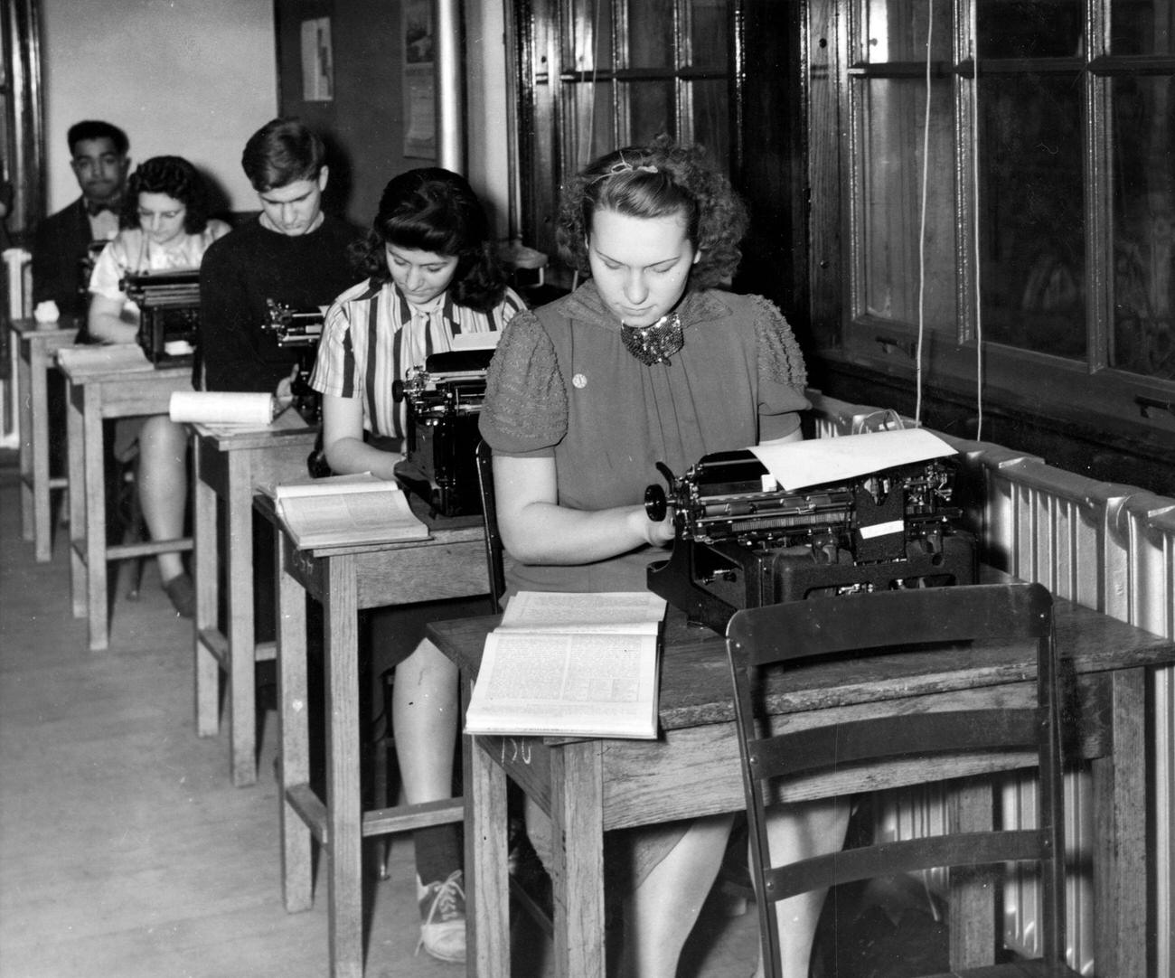 Students practicing touch typing at Hutchinson Central High School, Buffalo, New York, circa 1930.