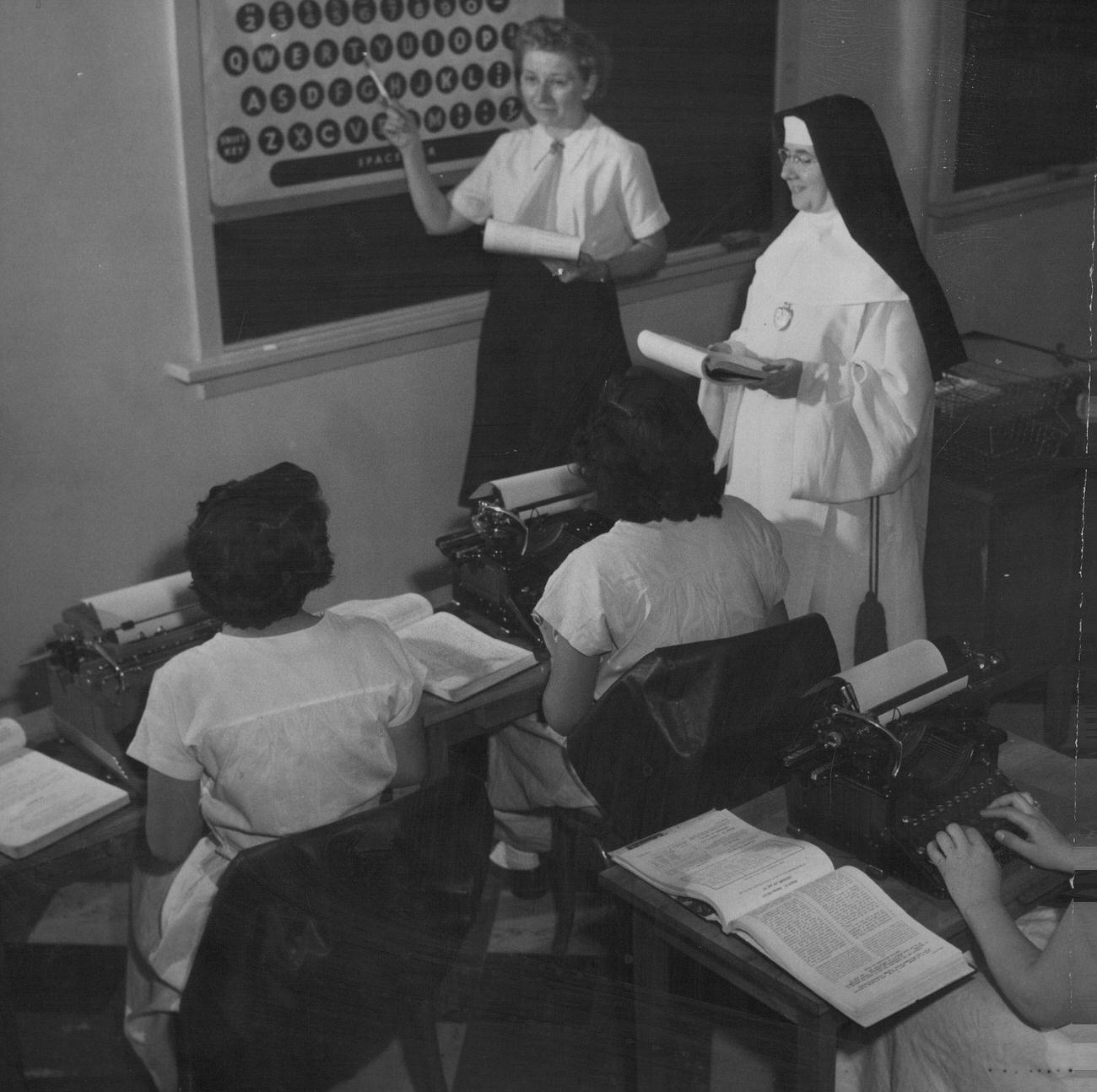 Sister Imelda Overseeing Typing Class, 1952