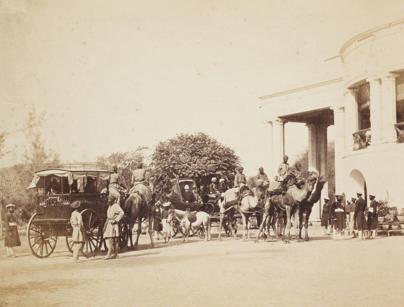 The Lieutenant Governor of the Punjab with camel carriages, India, circa 1865.