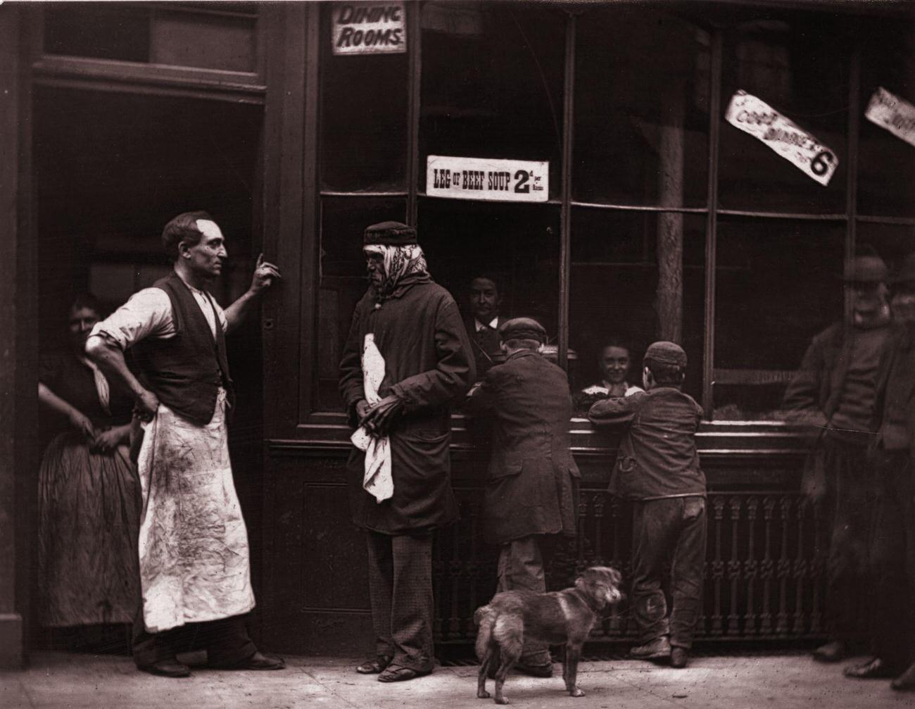 Former policeman Mr. Bayliss running a dining room for ex-convicts in London, 1877.