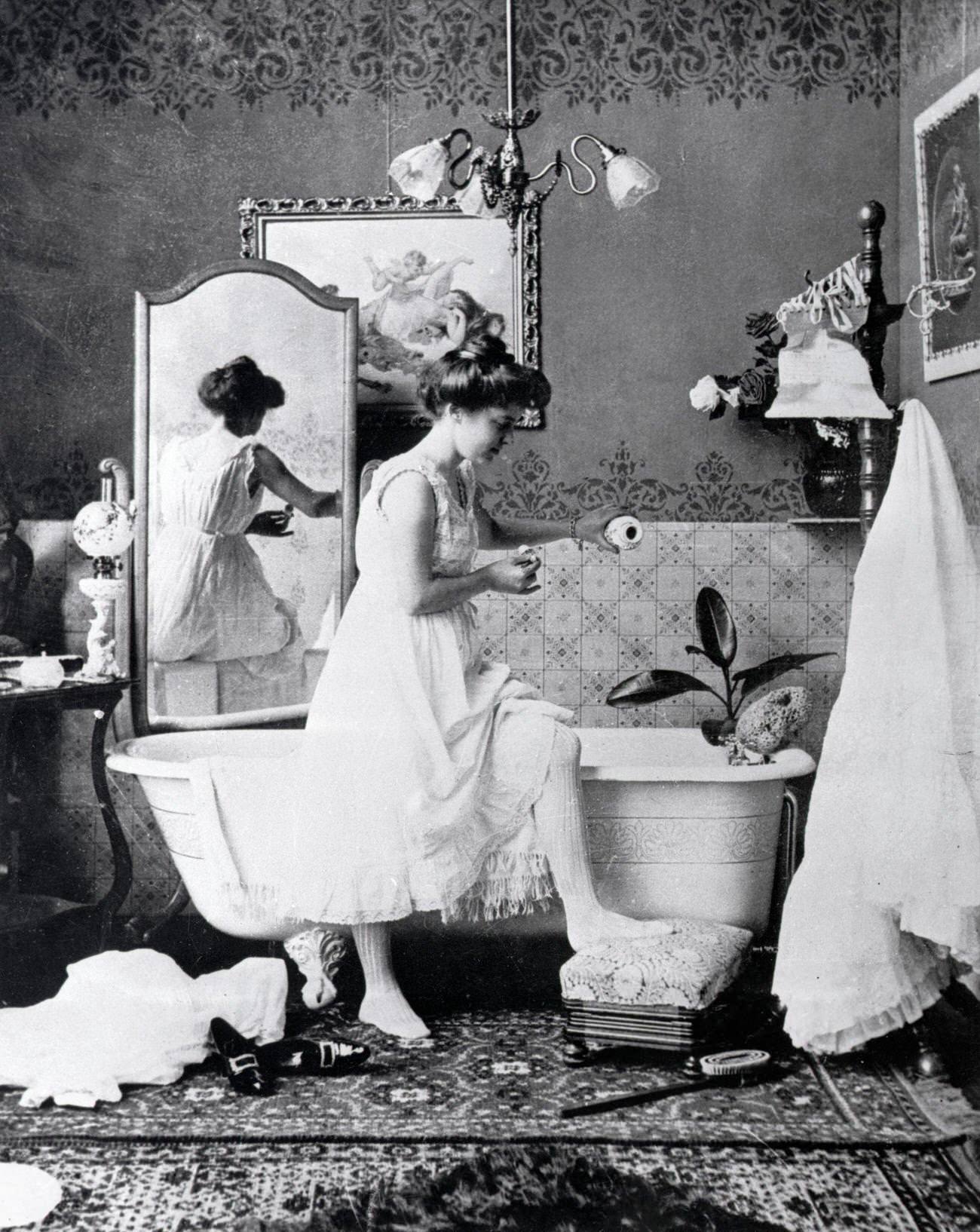 Victorian lady preparing for a bath, late 19th century.