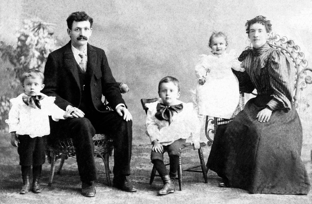 Victorian family with three children, 1890s.