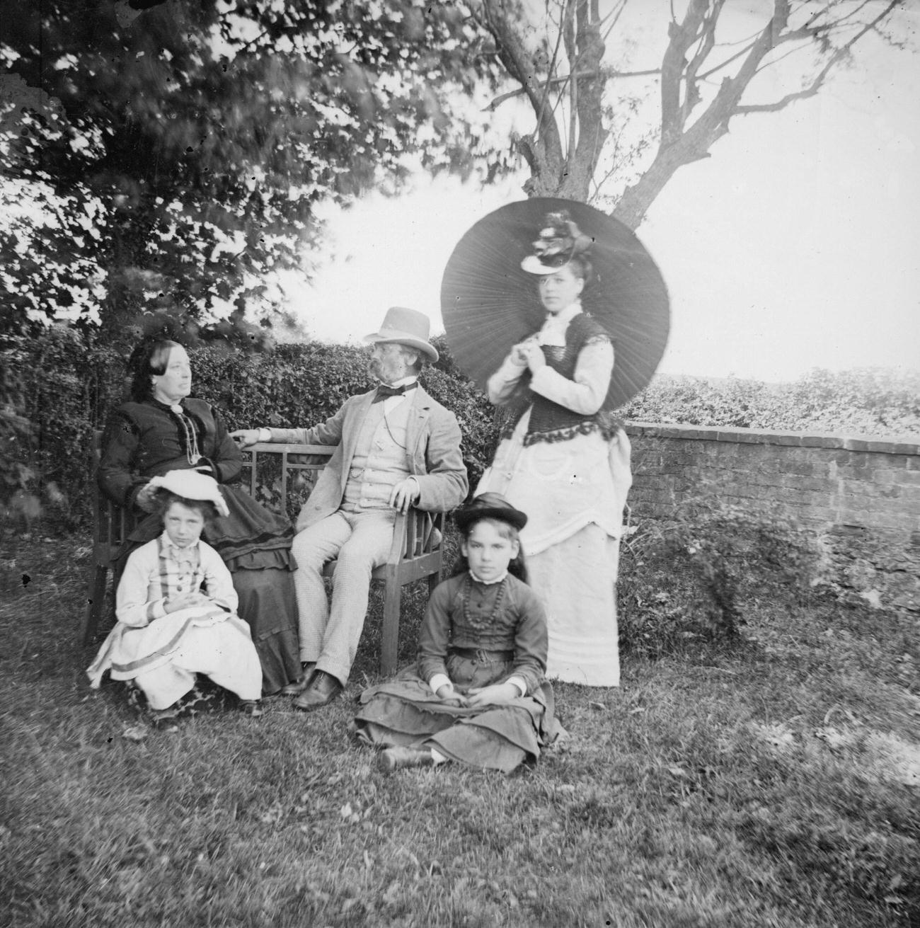 A Victorian family in their garden, circa 1895.