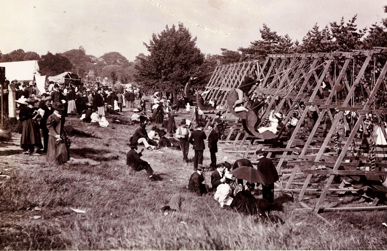 Fairground swing boats on Hampstead Heath, London, 1898.