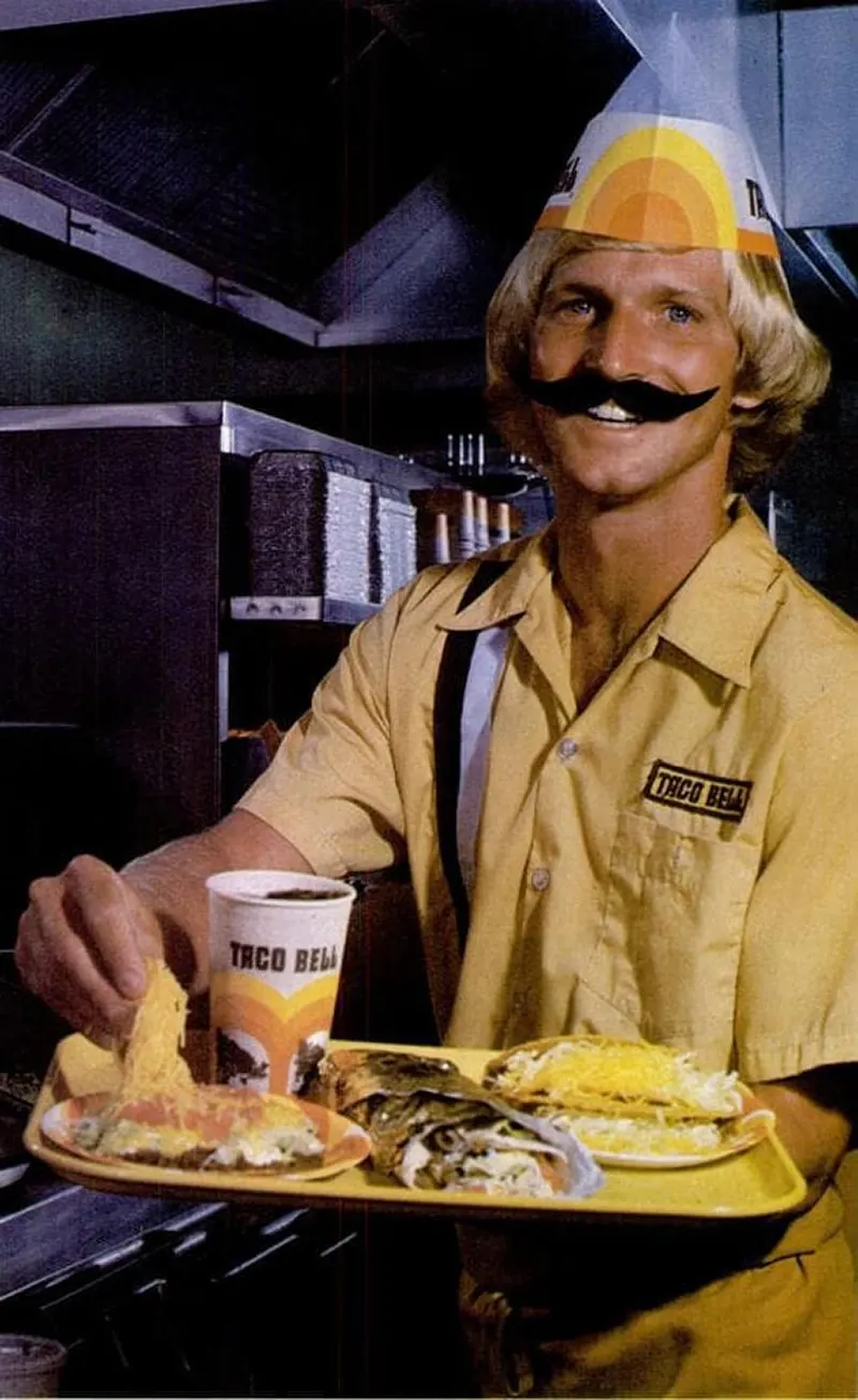 Taco Bell employees with fake mustaches, 1960s.