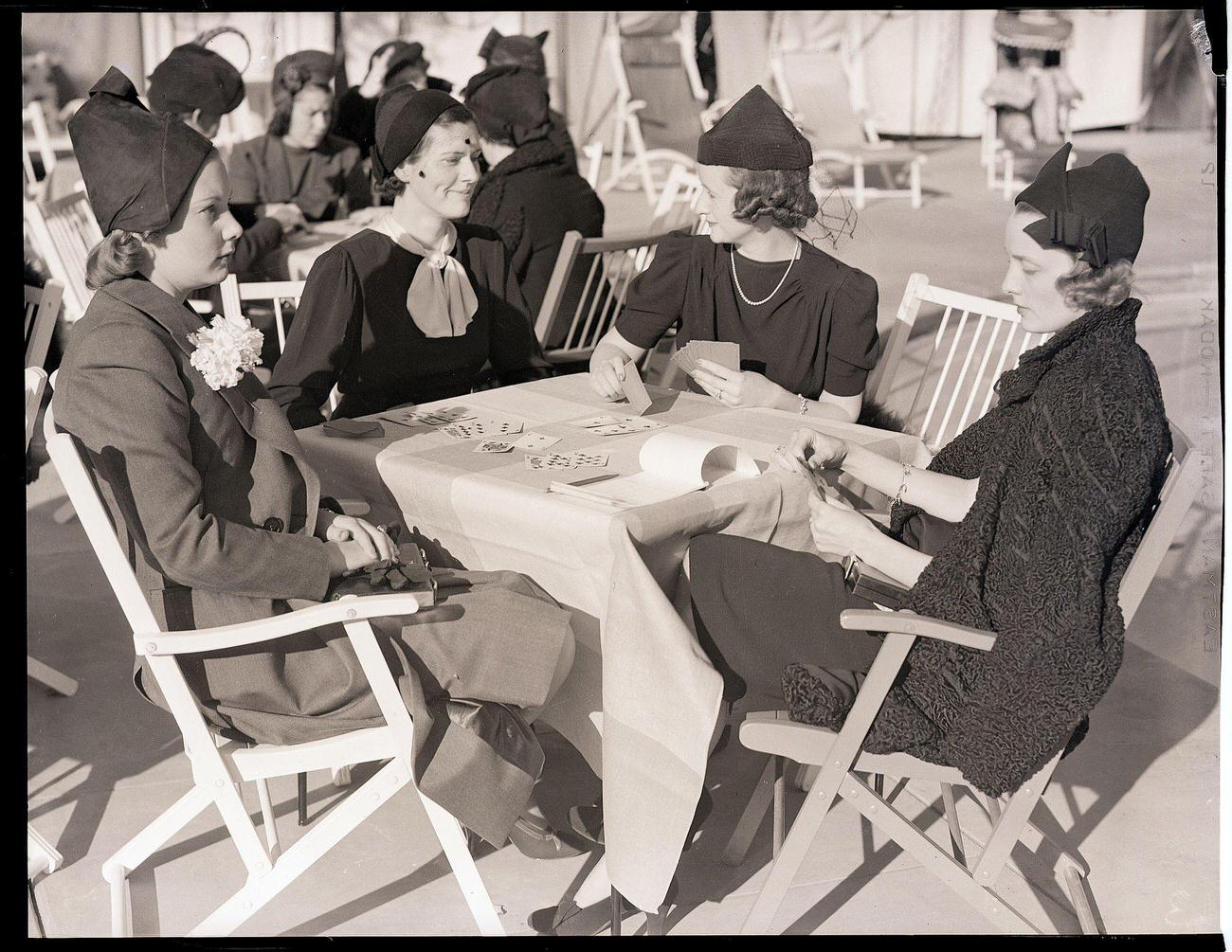 Wives of golf stars playing bridge, Pasadena, CA, February 8, 1938.