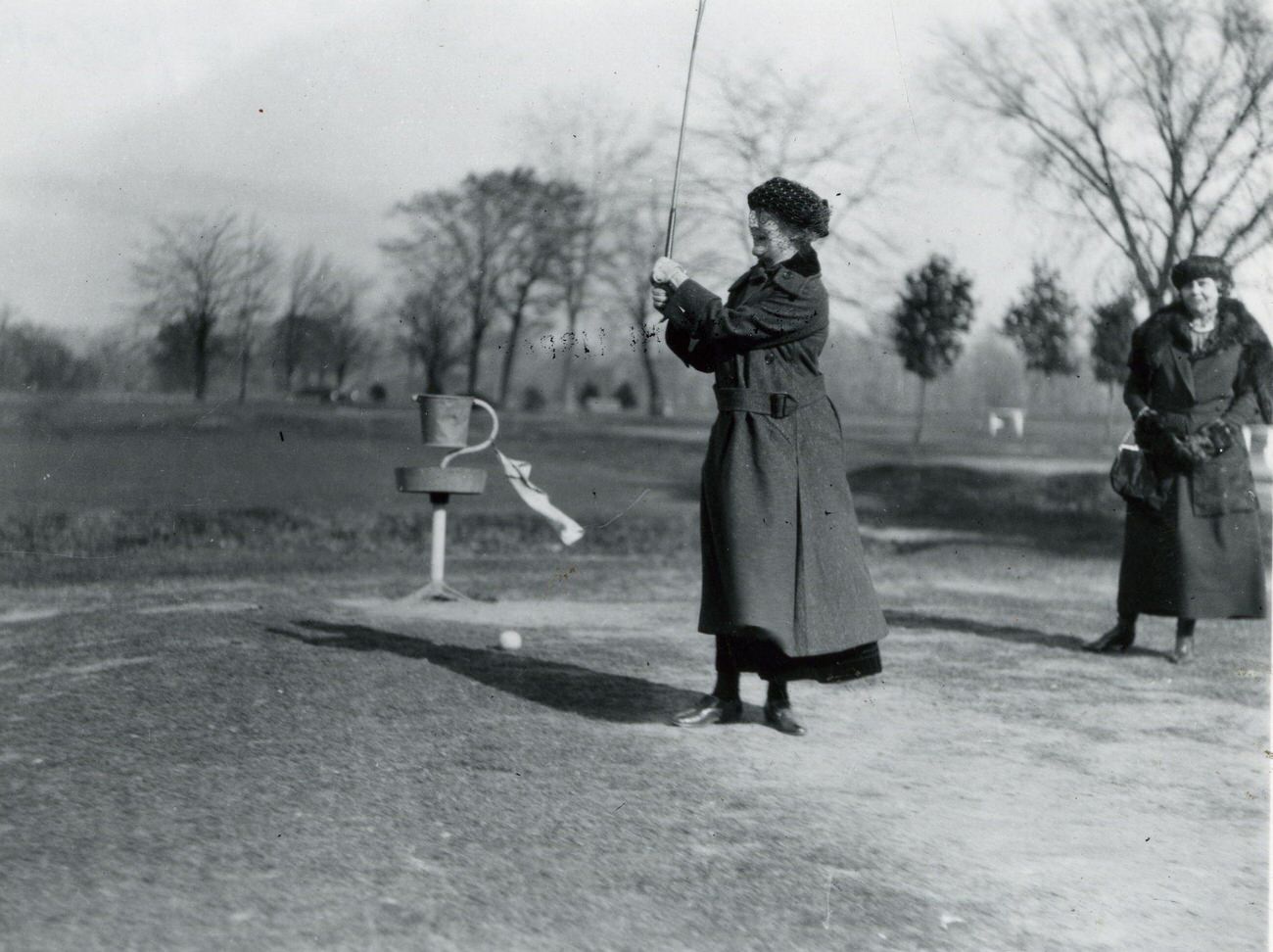 Woman golfer at Cincinnati Country Club, circa 1920s.