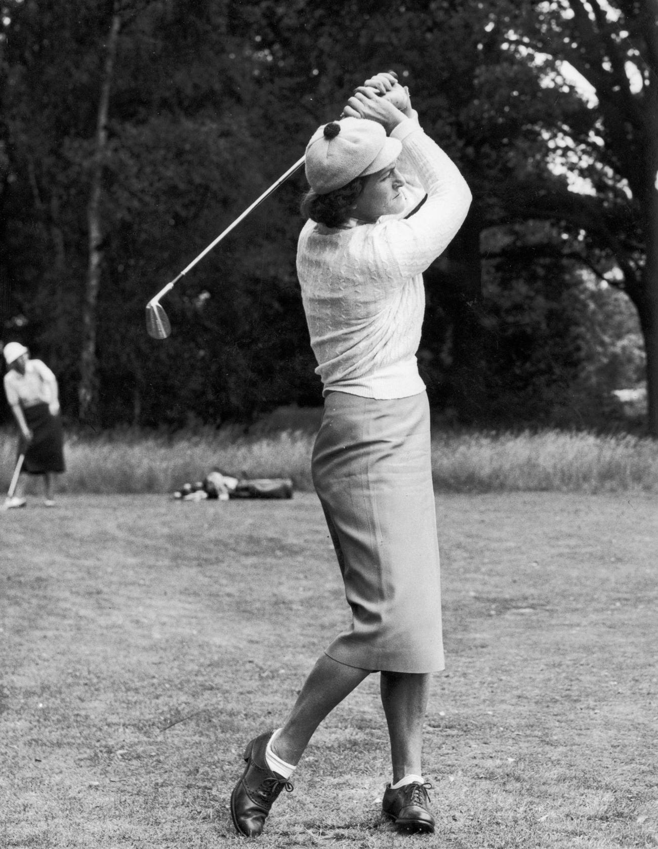 Babe Zaharias driving off, open tournament at Wentworth, July 16, 1931.