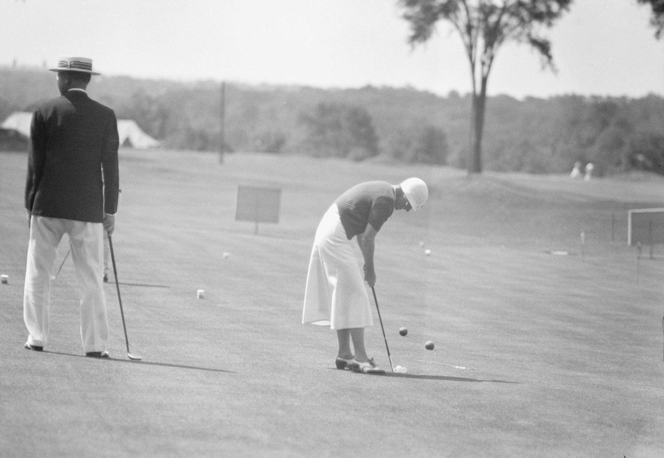 Mrs. Ellen Cassidy golfing, July 1932.