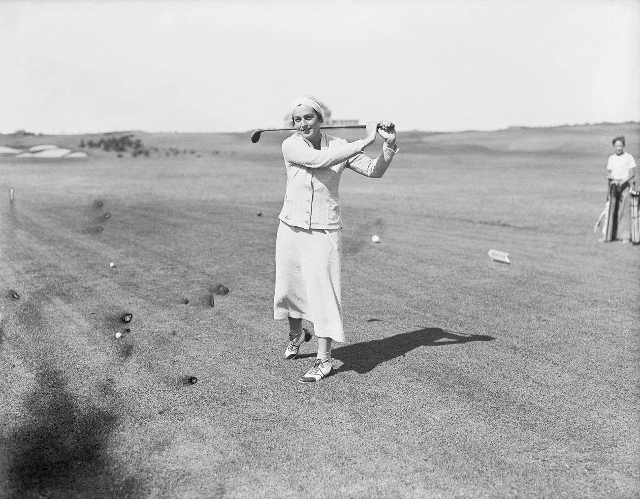 Frances Budlong playing golf in Newport, Rhode Island, July 25, 1932.