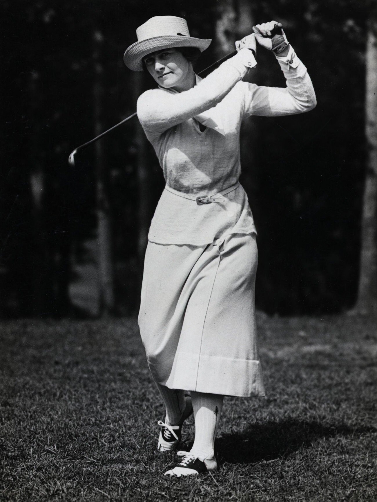 Mrs. Thomas Hucknall playing golf, undated photo.
