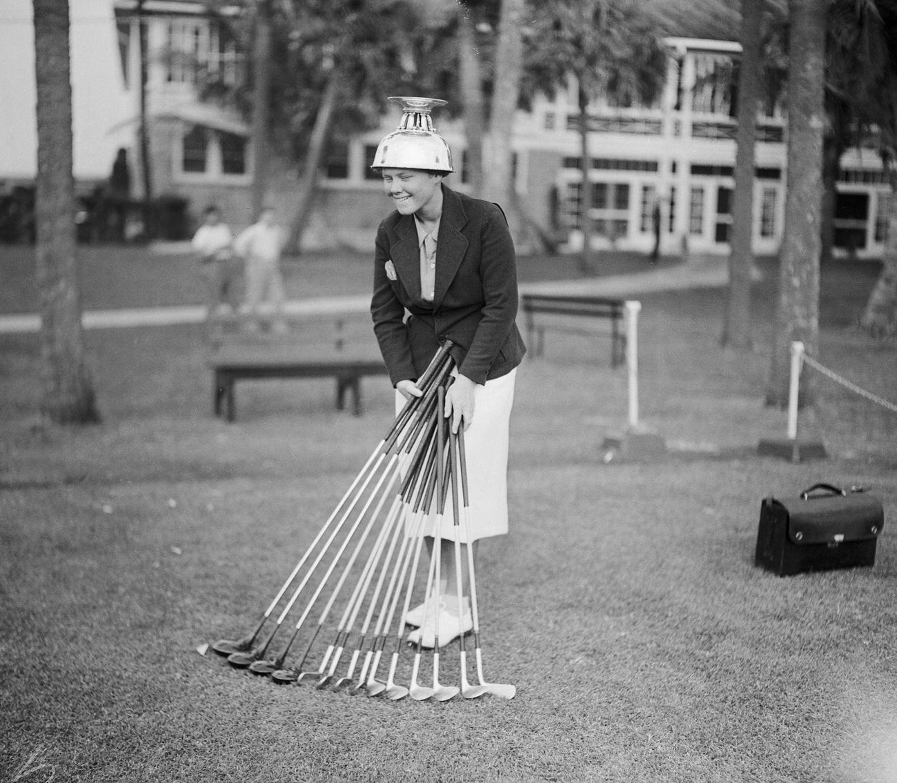 Patty Berg with championship golf clubs, Palm Beach Women's Golf Championship.