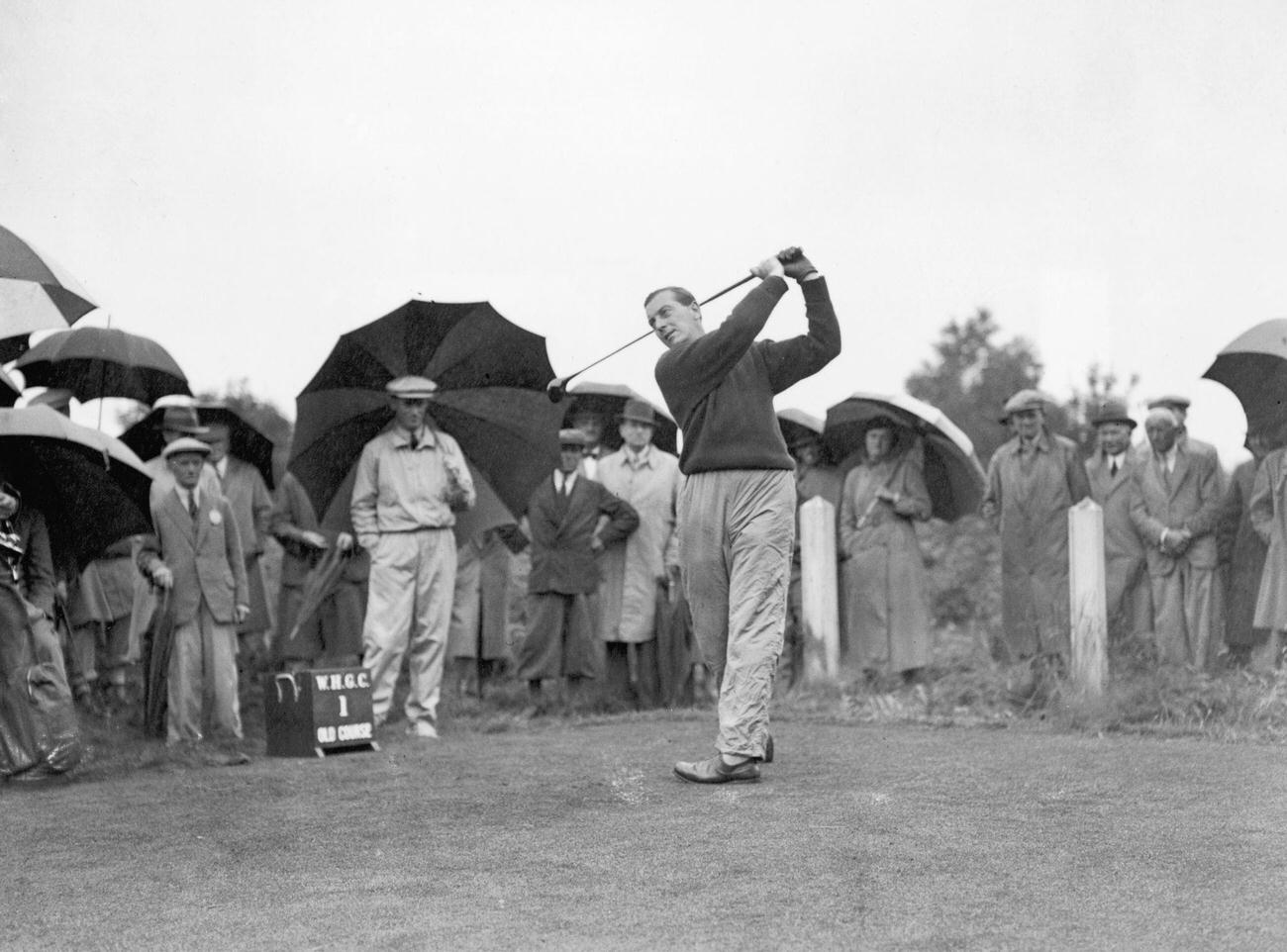 Henry Cotton driving off, Walton Heath, Surrey, July 12, 1937.