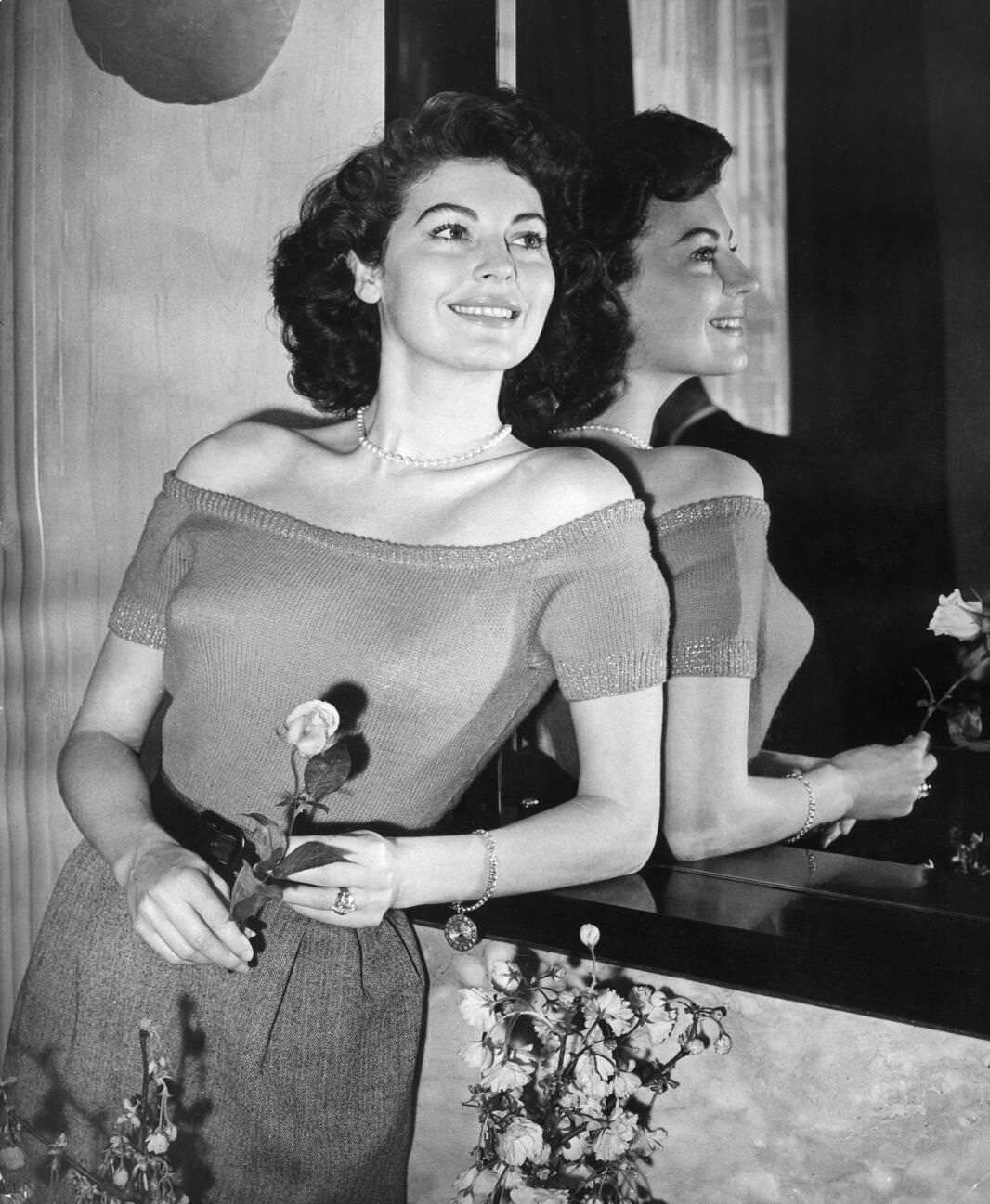 Ava Gardner portrait with rose, 1950, promoting "Pandora and the Flying Dutchman," released in 1951.