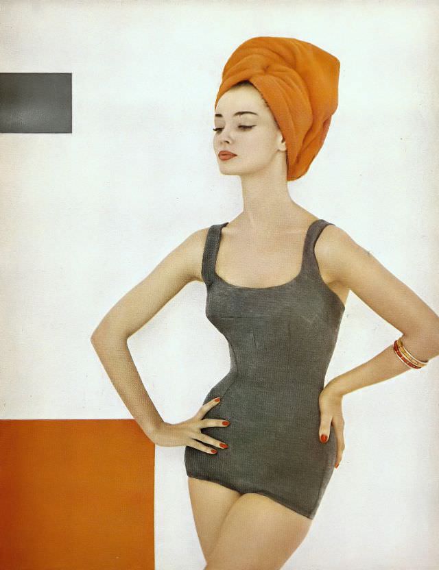 Dolores Hawkins in a heathery jersey swimsuit by Maurice Handler of California, Harper's Bazaar, June 1957.