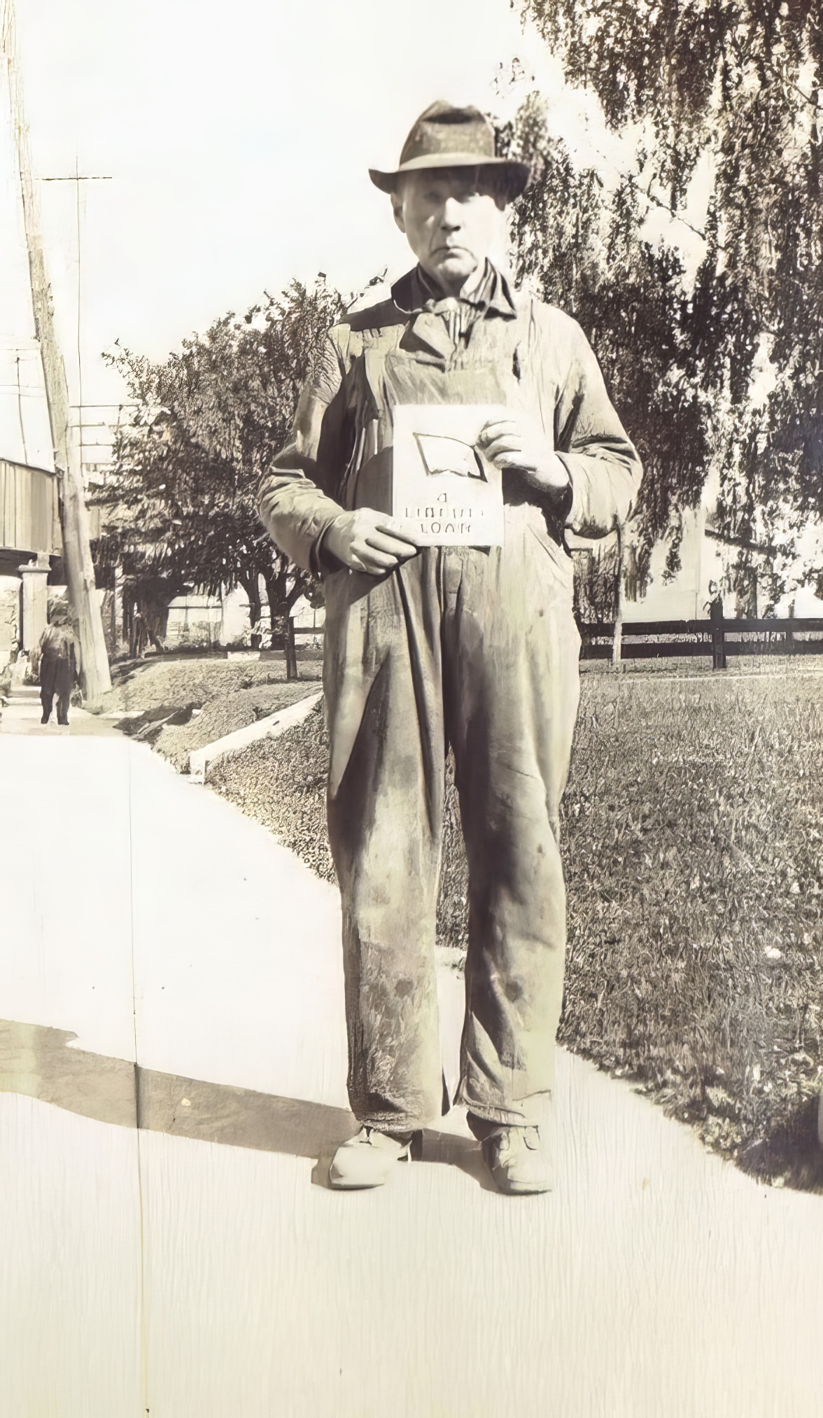 James Taney, a participant in the Liberty Bond campaign to support the Allies in World War I, standing near St. Patrick's Cemetery, Geneva, circa 1917