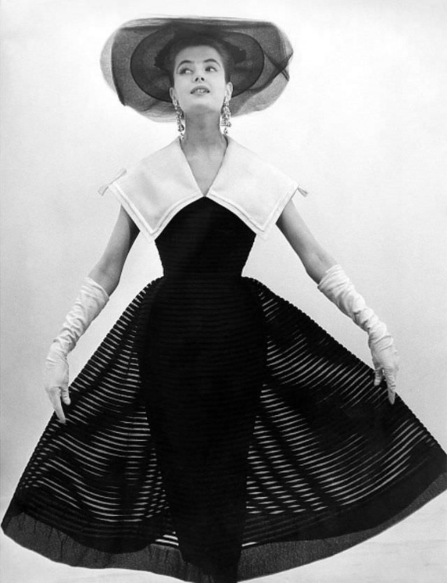 Gitta Schilling in cocktail dress by Sinaida Rudow, 1955.