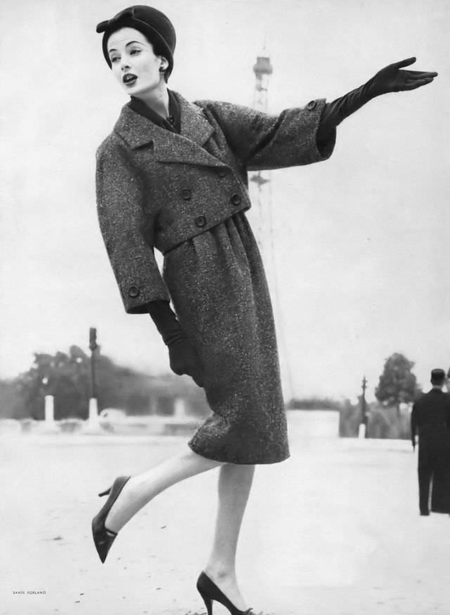Gitta Schilling in gray tweed suit by Dior, October 1, 1958.