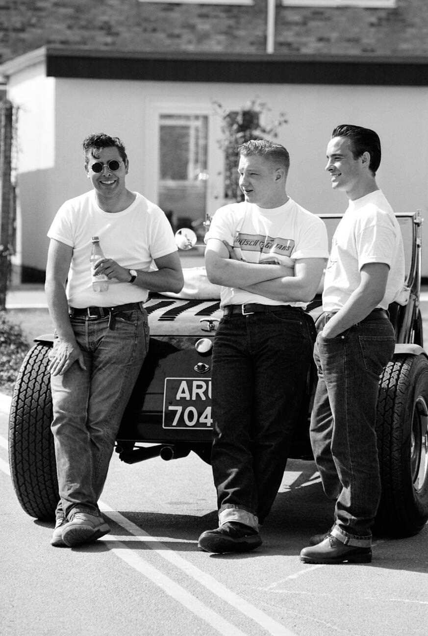 "Greasers" by their 1950s street rod at Hemsby rock 'n' roll retro festival.