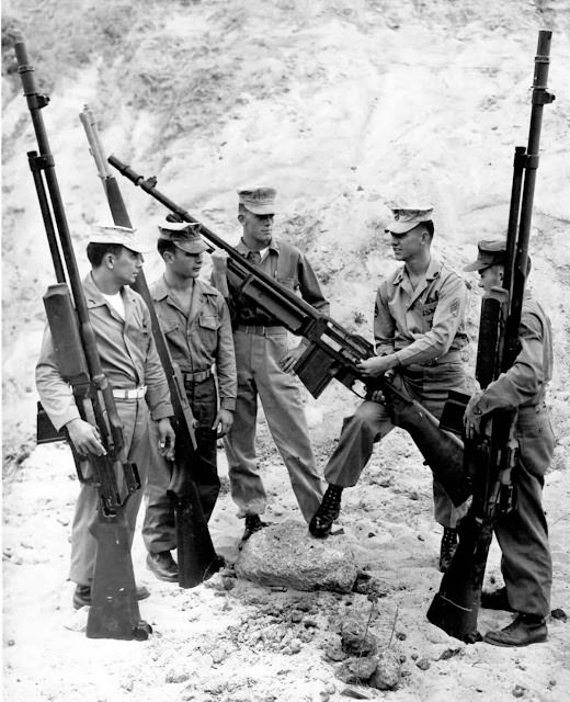 A Glimpse into 1956 Military Training at Camp Pendleton with Marines and Their Massive Guns