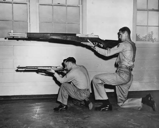 A Glimpse into 1956 Military Training at Camp Pendleton with Marines and Their Massive Guns