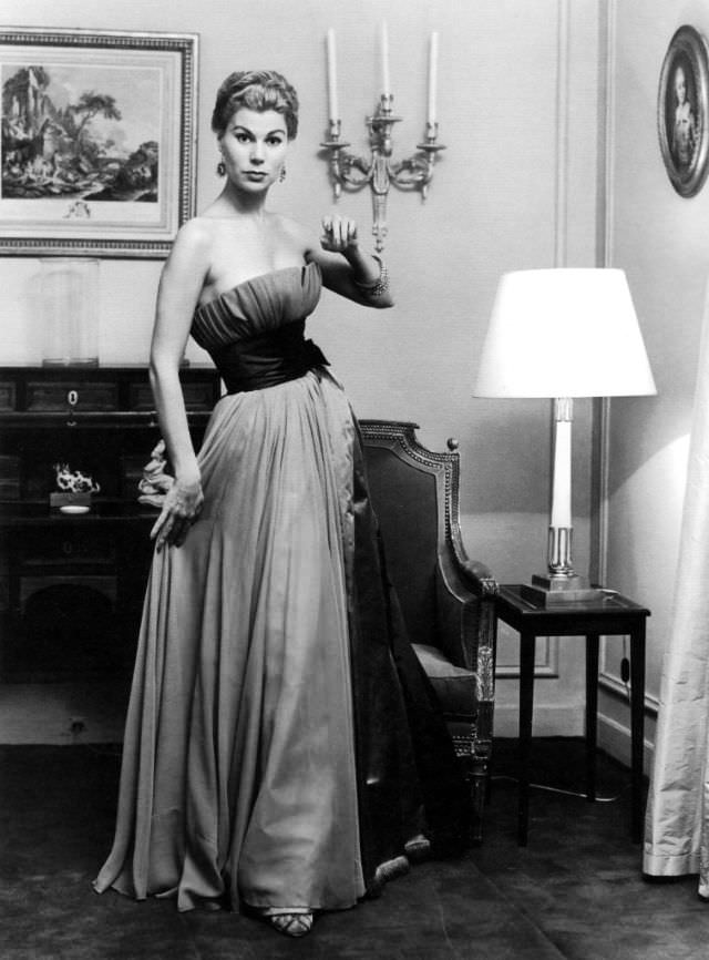 Stella in a pale blue mousseline evening gown by Jacques Fath, 1953.