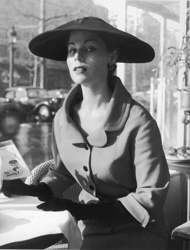 Stella in a suit by Jacques Fath, Paris, 1953.