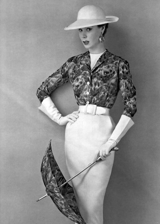 Stella in a white linen dress with a printed bolero by Givenchy, 1953.