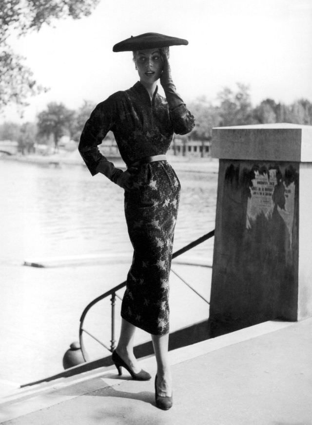 Stella in a printed velvet dress for fall/winter by Madeleine de Rauch, Paris, 1953.