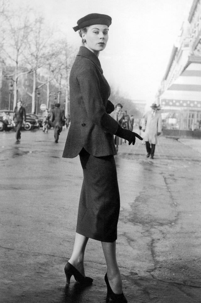 Stella in an ensemble by Jacques Fath, Paris, 1953.