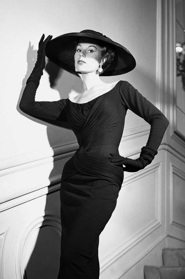 Stella in a sheath dress by Christian Dior, 1954.