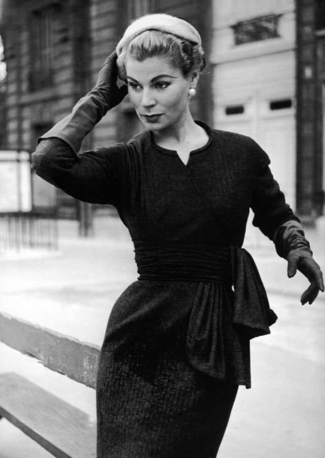 Stella in a slim wool dress by Jacques Fath, Paris, 1955.