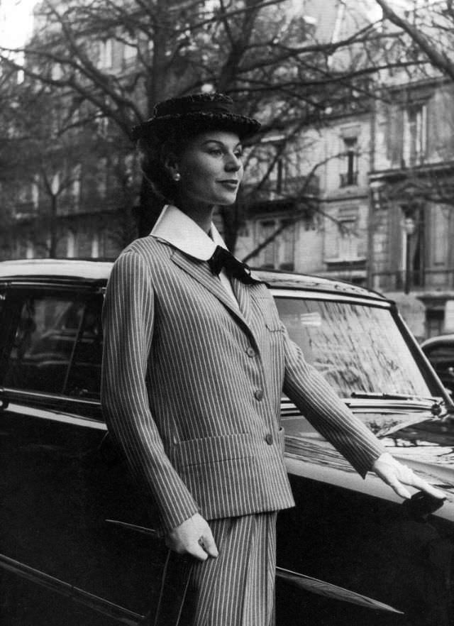 Stella in a suit by Jacques Fath, 1955.