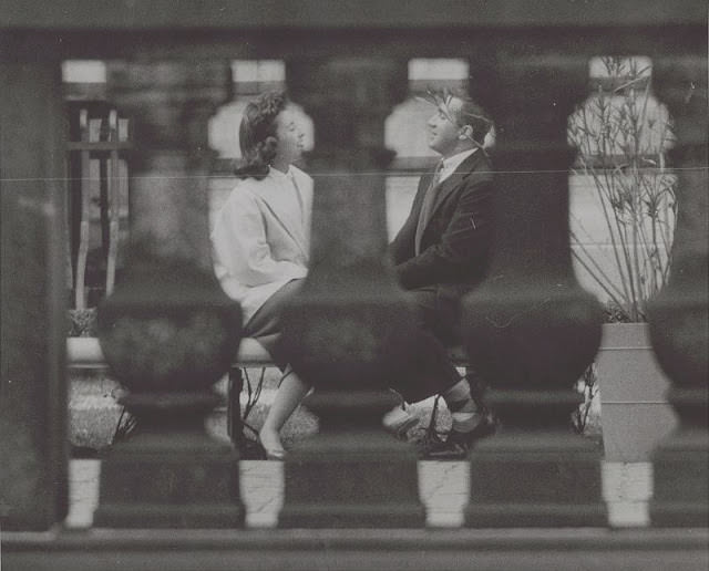 Couple sitting on a bench in New York City, September 1956