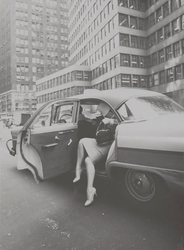 Unidentified woman exiting a taxi in New York City, June 1959