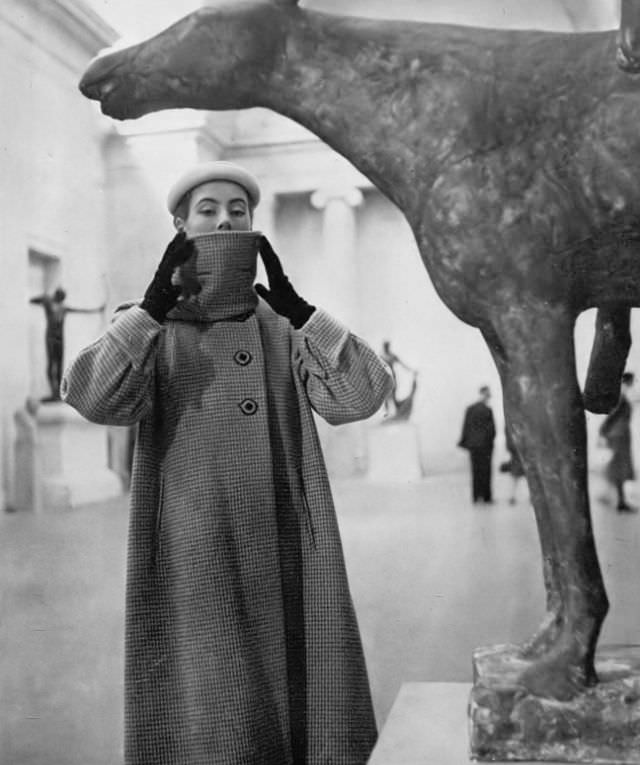 Pat O'Reilly in a reversible coat by Rima, Harper's Bazaar UK, November 1951.