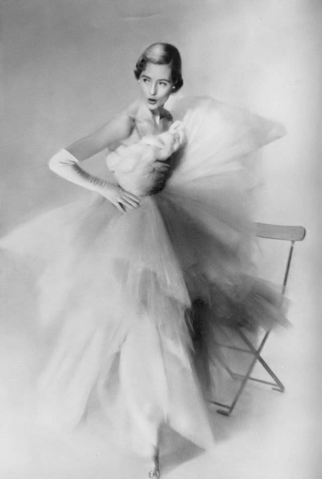 Pat O'Reilly in a fairy dress of pink tulle by Hardy Amies, Harper's Bazaar UK, March 1950.